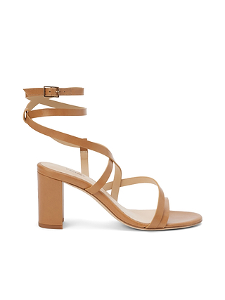 The Emily Sandal is a tan leather strappy sandal featuring a block heel and ankle wrap strap, displayed in a side profile on a white background.