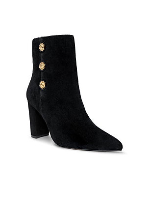 Theodora Block-Heel Bootie in black suede features a pointed toe and three gold side buttons, displayed against a white background.
