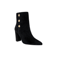 The Theodora Block-Heel Bootie is a black suede ankle boot featuring a pointed toe, block heel, and three decorative gold buttons on the side, shown against a plain white background.