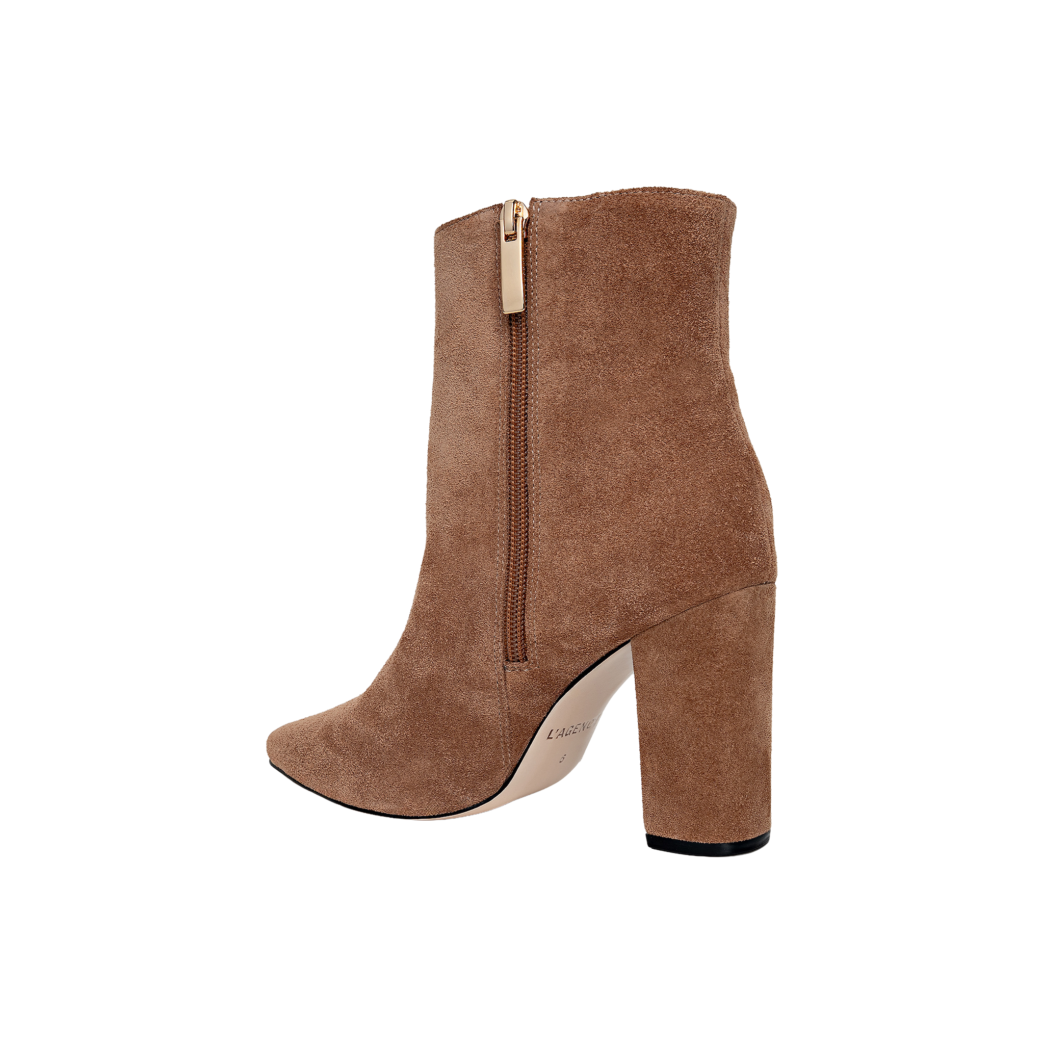 The Theodora Block-Heel Bootie is shown in tan suede with a chunky block heel, pointed toe, and a side zipper. Photographed against a plain white background, the bootie is displayed from a side profile view.