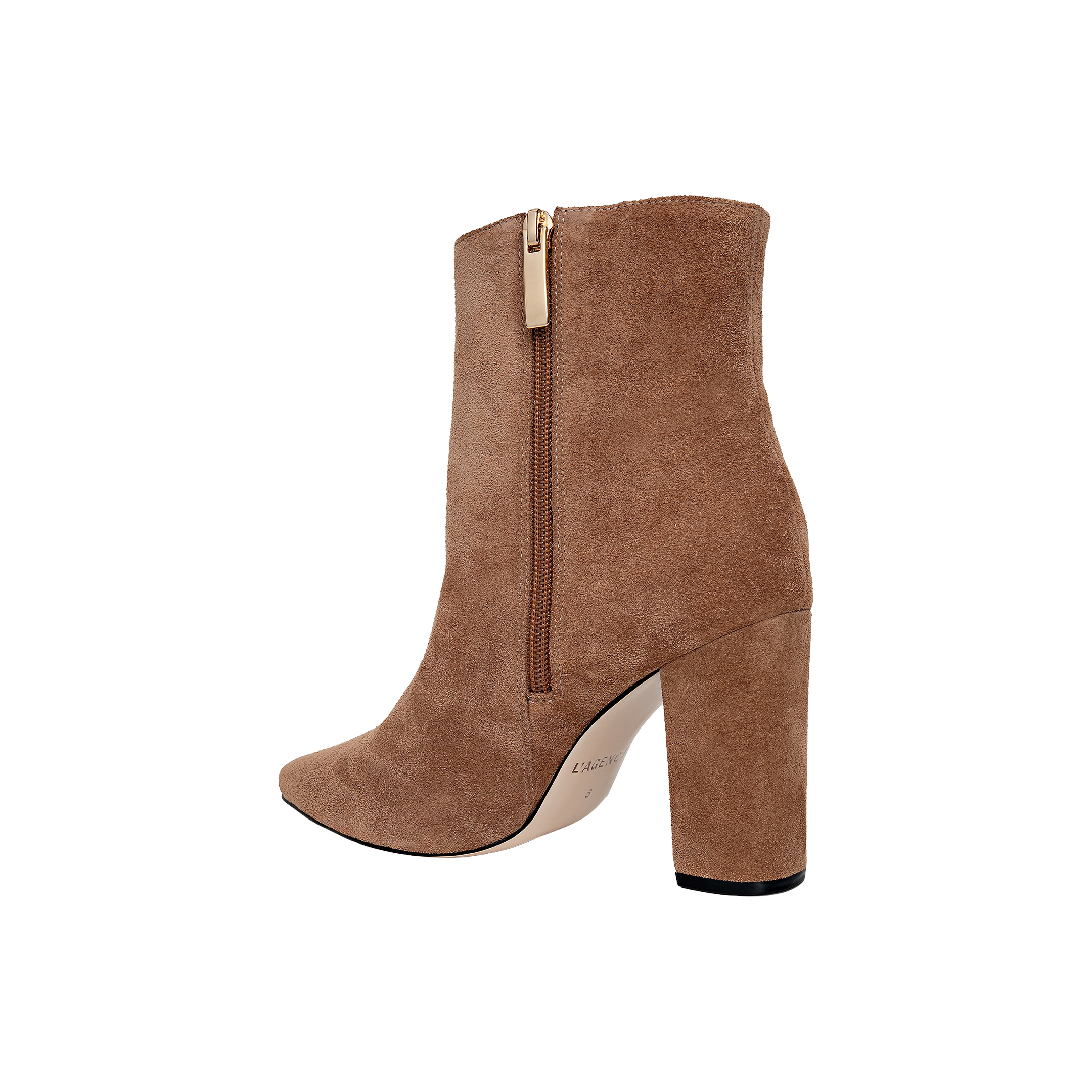 The Theodora Block-Heel Bootie is shown in tan suede with a chunky block heel, pointed toe, and a side zipper. Photographed against a plain white background, the bootie is displayed from a side profile view.