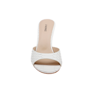 The Avery Leather Open-Toe Mule is a white sandal showcasing a scalloped scale pattern in snake-embossed leather, complemented by a beige insole and set against a plain white background.