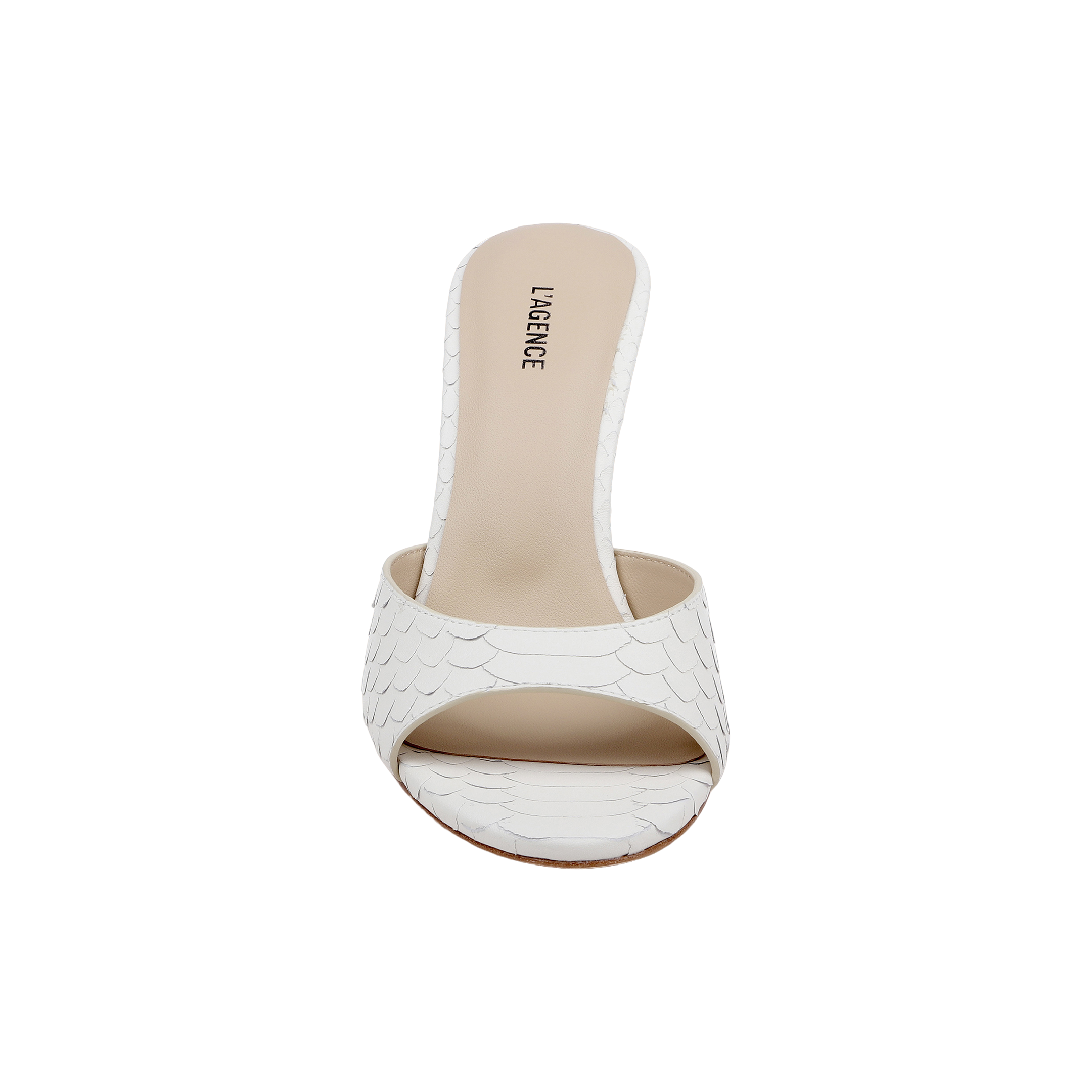 The Avery Leather Open-Toe Mule is a white sandal showcasing a scalloped scale pattern in snake-embossed leather, complemented by a beige insole and set against a plain white background.