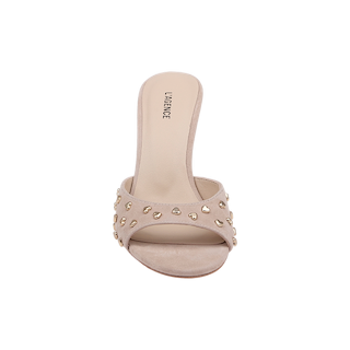 Introducing the Avery Embellished Mule: a tan suede open-toe sandal featuring a wide strap adorned with gold studs and a stylish flared high heel. The insole is branded with LA GENOVE, and the shoe is displayed against a plain white background.