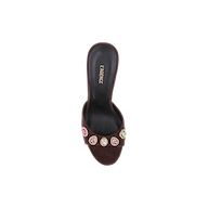 The Avery Suede Open-Toe Mule is a mahogany brown sandal crafted from suede, featuring an open toe, a black insole labeled LAGENCE, and colorful jeweled embellishments on the front strap, displayed against a white background.