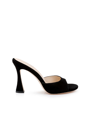 The Avery Suede Open-Toe Mule is a black sandal with a wide front strap and sculpted stiletto heel, shown on a plain white background.