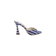 The Avery Open-Toe Mule showcases a flared heel with a blue denim upper adorned with white diagonal stripes, featuring an open-toe and open-back design, all displayed against a plain white background.
