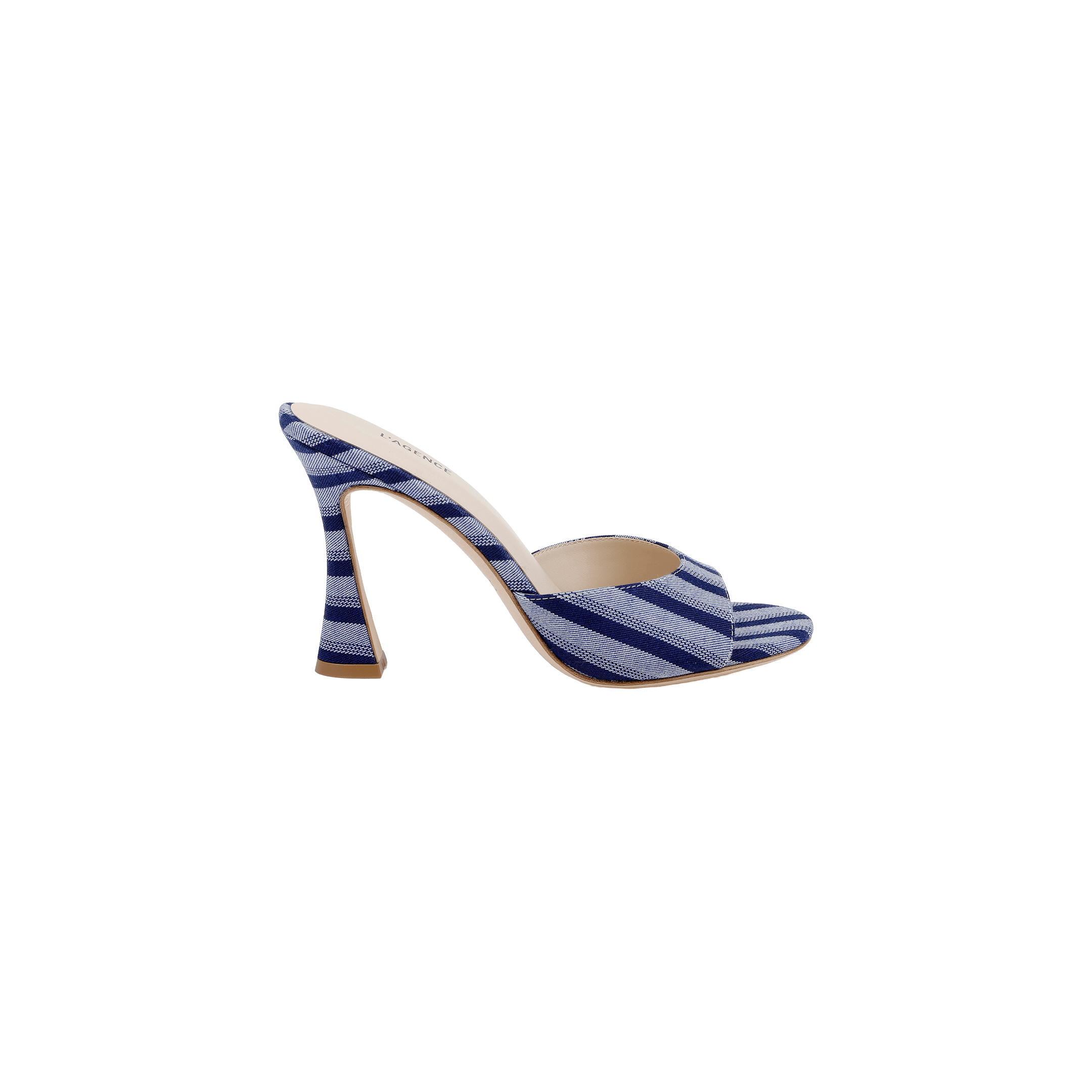The Avery Open-Toe Mule showcases a flared heel with a blue denim upper adorned with white diagonal stripes, featuring an open-toe and open-back design, all displayed against a plain white background.