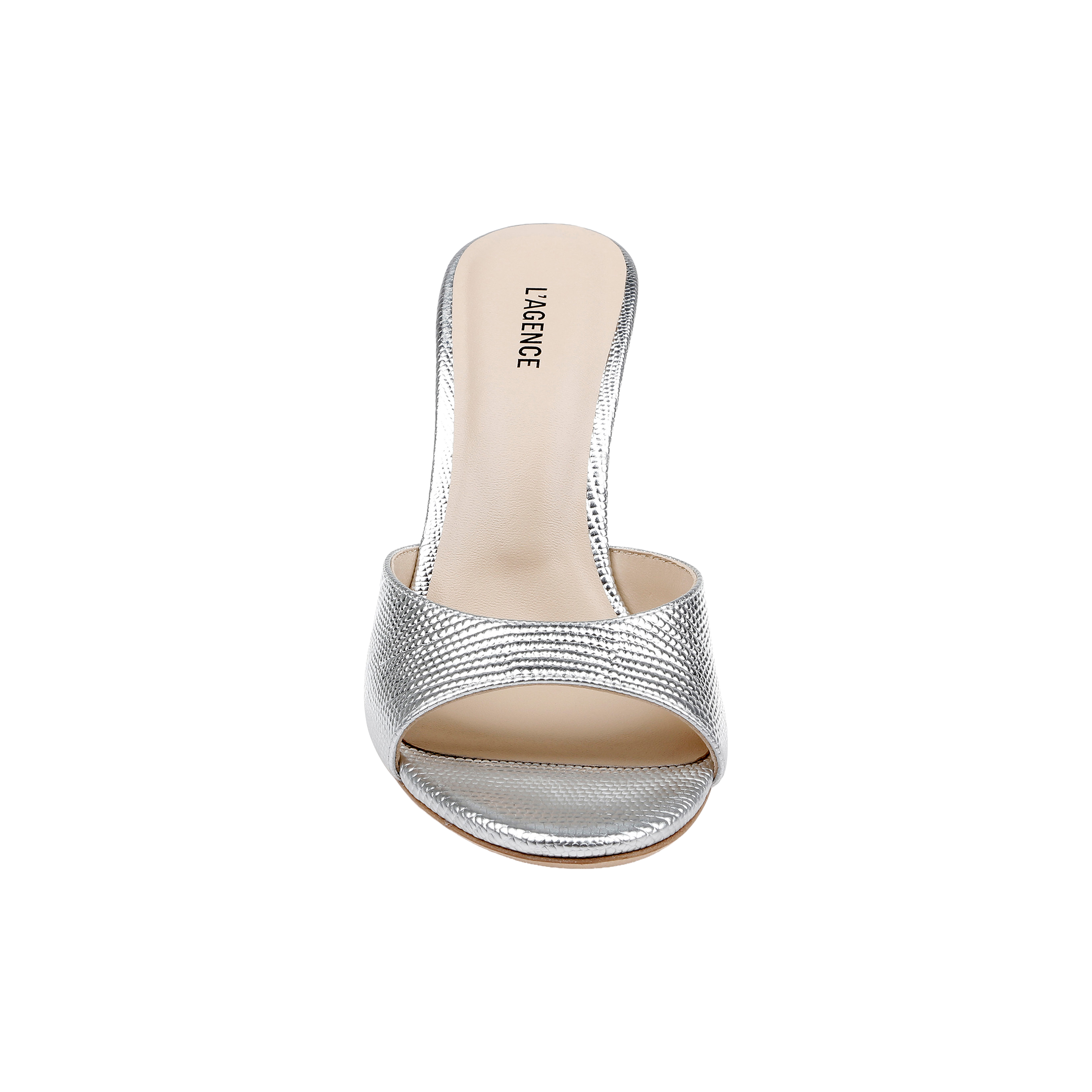 The Avery Leather Open-Toe Mule features silver lizard-embossed leather, a sculpted high heel, and a light beige insole with L.A. MENCE printed on the heel area, shown from an overhead view against a white background.
