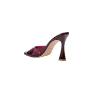 Introducing the Avery Open-Toe Mule: a striking stiletto mule showcasing a high-heeled, glossy brown heel, an open-toe silhouette with a pink-tinted transparent strap, and a natural tan sole—all presented on a plain white background.