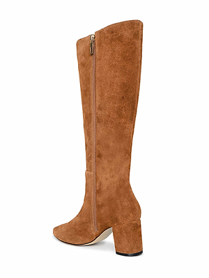 The Eugenie Block-Heel Boot in tan suede features a side zipper and chunky block heel, displayed from a side angle against a white background.