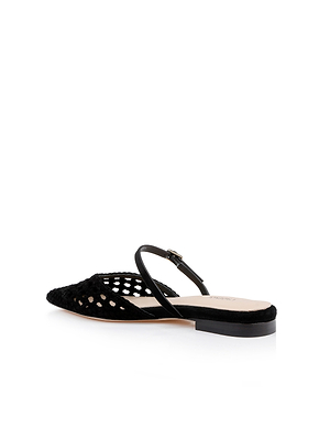 The Jacklyn Suede Flat Mule by L'AGENCE Sale is a black pointed-toe flat with a low heel, woven suede upper, and slim adjustable strap, shown on a white background.