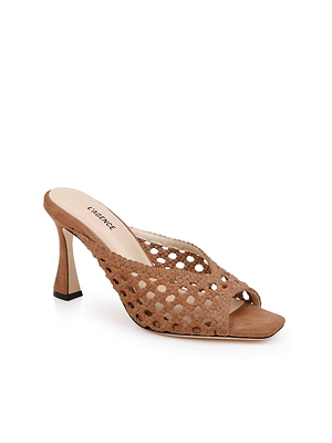 The Jacques Suede Mule features tan woven suede, an open toe, high stiletto heel, intricate cutout pattern, V-cut vamp, square-shaped sole, and “L’AGENCE” branding on the insole.