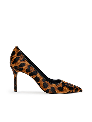 The Maelle Pump is a high-heeled, pointed-toe shoe featuring a brown and black leopard print on hair calf leather, with a textured, fur-like finish, slim heel, and sleek design for timeless elegance.