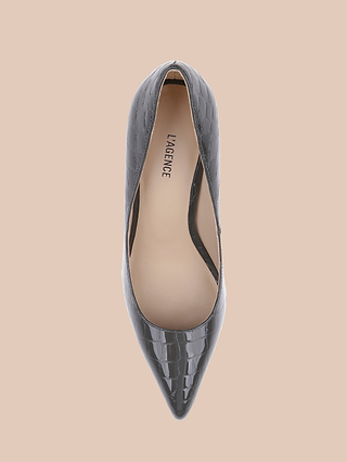 A single black, crocodile-embossed leather pointed-toe Maelle Leather Pump, viewed from above on a beige background. The tan insole features the brand name LAGENCE in black letters.