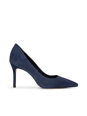 The Maelle Suede Pump by L'AGENCE is a navy blue stiletto with a pointed toe, slim heel, and memory foam insole for comfort, shown on a plain white background.