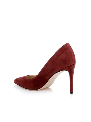 The Maelle Suede Pump is a single brown shoe with a pointed toe and stiletto heel, displayed in profile against a white background.