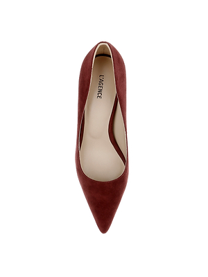 A top view of the Maelle Suede Pump—a single burgundy stiletto with a pointed toe, beige insole, and luxurious suede finish—displayed on a white background.