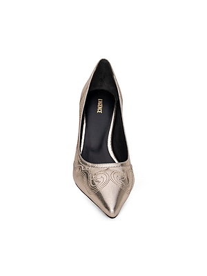 The Amandine Western Pump by L'AGENCE is a metallic pointed-toe stiletto with a black insole and elegant stitched swirl patterns on the toe, shown against a white background.