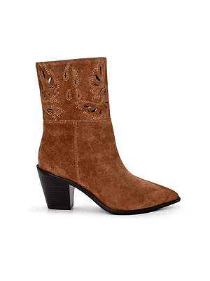 The Anne Western Bootie features brown suede, a pointed toe, decorative cutout patterns on the shaft, and a chunky black angled heel.