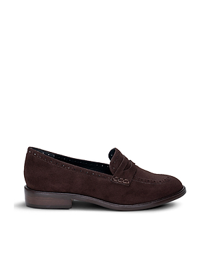 The Avriel Brogue Loafer is a dark brown suede loafer featuring an almond toe, low heel, decorative stitching, and a penny strap detail on the upper, shown in side profile on a white background.