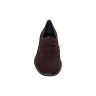The Avriel Brogue Loafer is displayed from a top-down perspective against a white background. This women’s loafer in dark brown suede showcases classic penny loafer detailing, visible stitching, and an elegant almond toe silhouette.