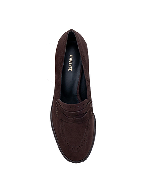 A top view of the Avriel Brogue Loafer: a dark brown suede women's loafer with an almond toe, brogue detailing, black insole, and gold LAGENCE branding, photographed on a white background.