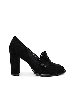 The Bea Brogue Block-Heel Loafer is a women's black suede loafer with a chunky heel and decorative front strap, shown in side profile on a white background.