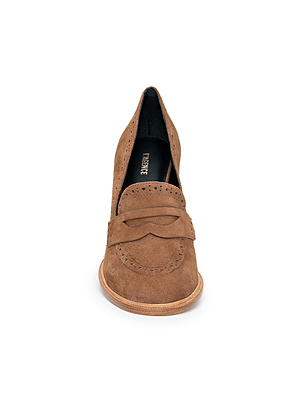 The Bea Brogue Block-Heel Loafer is a tan suede women’s statement shoe featuring decorative stitching and a wooden sole, shown from the front on a white background.