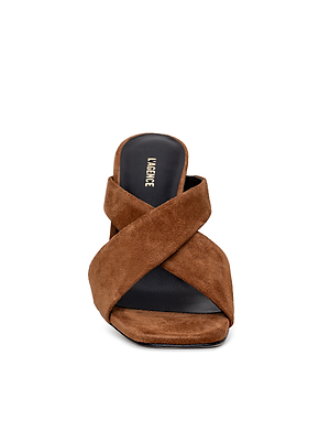 Front view of the Mirabelle Suede Sandal in brown buckskin with crisscross straps and a memory foam insole, shown against a white background.