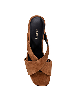 The Mirabelle Suede Sandal features brown buckskin suede with wide crisscross straps, a memory foam insole, and 