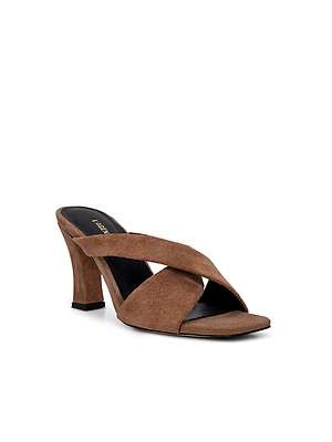 The Mirabelle Suede Sandal is a tan heeled sandal with wide crisscross straps, an open toe, and a cushioned memory foam insole, shown on a white background.
