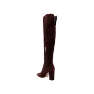 The Nanette Boot, a single mahogany brown suede over-the-knee style featuring a thick high heel, side zipper, and slightly pointed toe, is displayed on a white background.