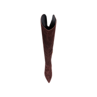 The Nanette Boot is a single tall over-the-knee boot in mahogany brown suede, shown from above with a pointed toe and wide opening against a light background.