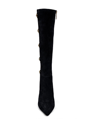 The Octavie Knee-High Boot by L'AGENCE features black suede, a pointed toe, mid-block heel, gold side zipper, and decorative gold buttons along the outer side.