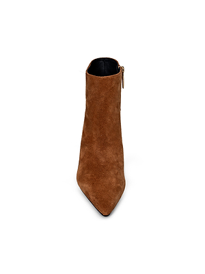 The Lilly Kitten-Heel Bootie is a brown suede pointed-toe city boot with a side zipper and a subtle kitten heel, shown from the front on a white background.