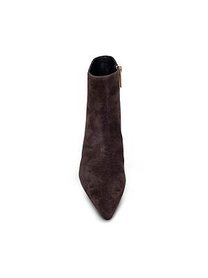 The L'AGENCE Lilly Kitten-Heel Bootie, a dark brown suede pointed-toe city boot with a minimalist design and visible side zipper, is displayed from a top-down angle on a white background.