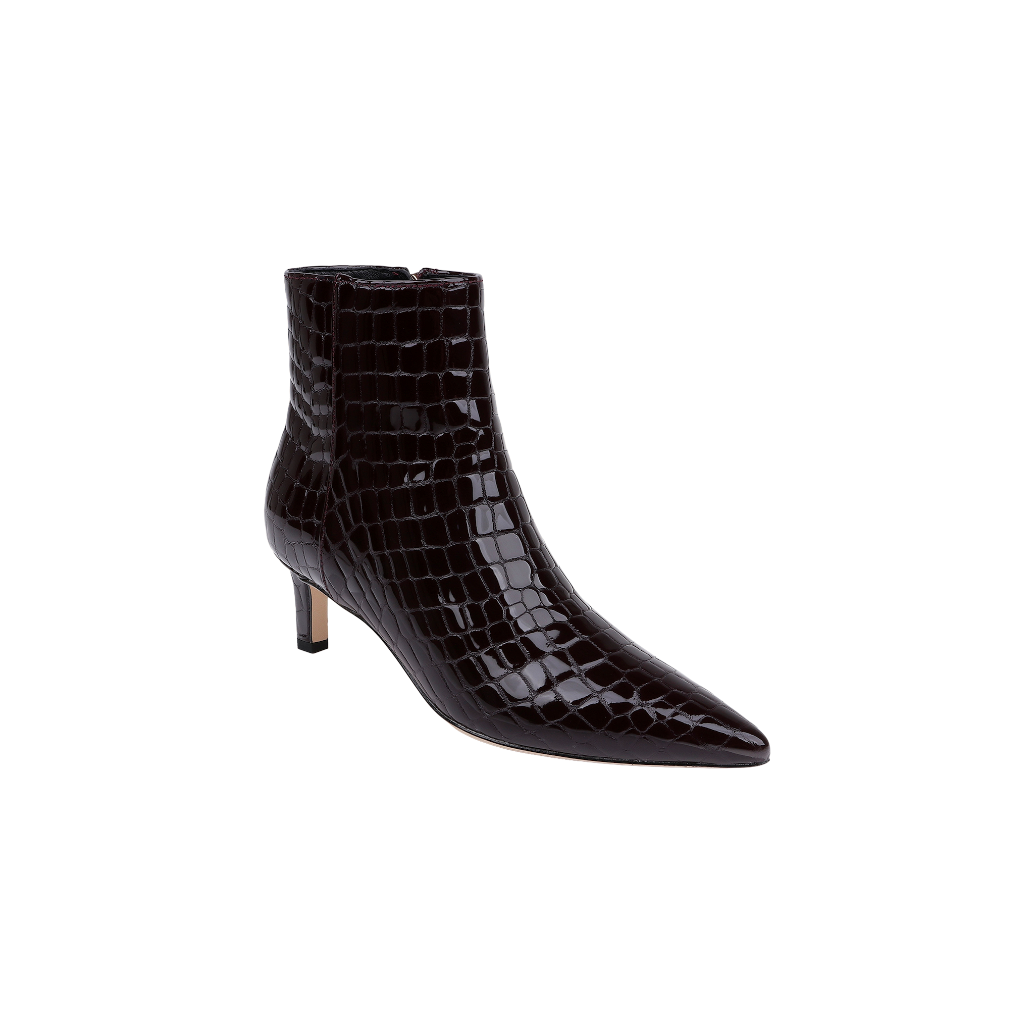 The Lilly Kitten-Heel Bootie is a dark brown, pointed-toe city boot featuring a low kitten heel and a glossy, crocodile-embossed leather texture, displayed against a plain white background.