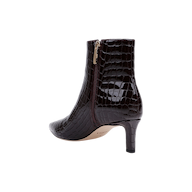 Sure Here’s the sentence rewritten using the product name: The Lilly Kitten-Heel Bootie is a dark brown, crocodile-embossed leather city boot featuring a pointed toe, side zipper, and mid-height kitten heel, displayed against a white background.