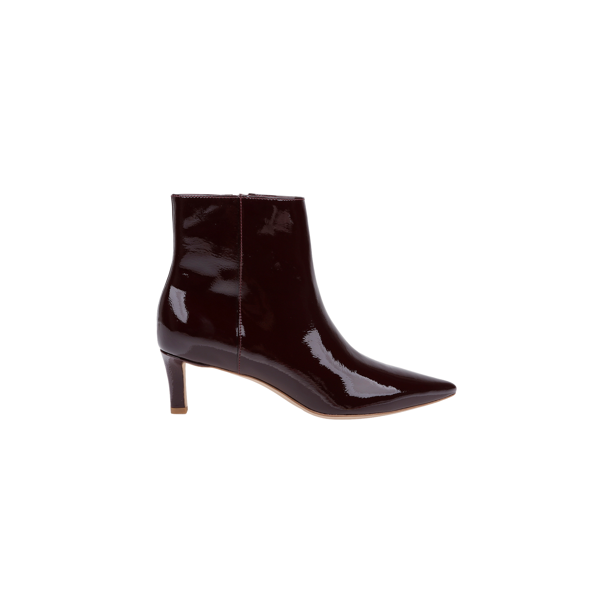 The Lilly Kitten-Heel Bootie is a shiny, dark brown ankle boot crafted from patent leather, featuring a pointed toe and a mid-height kitten heel, shown in profile on a plain white background.