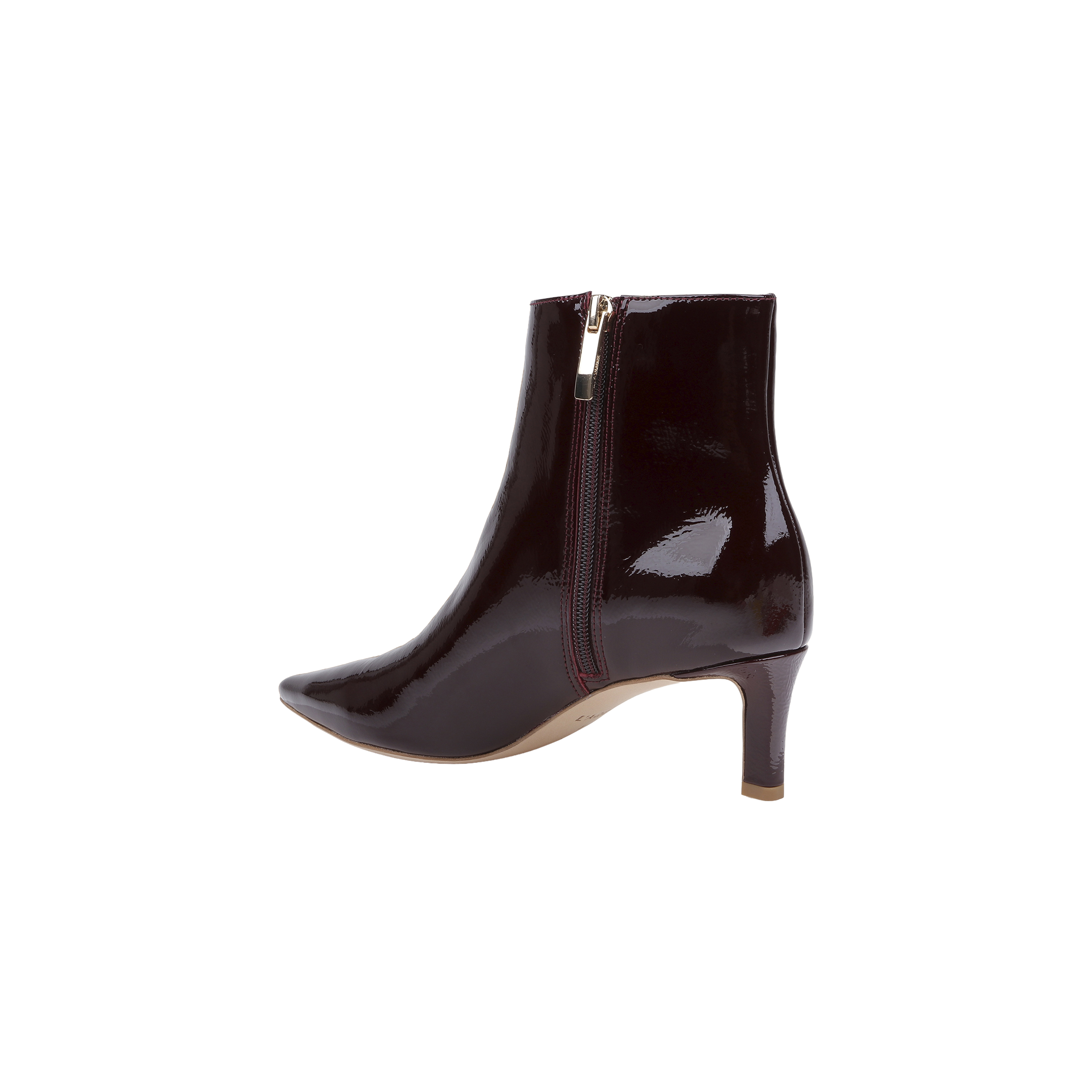 The Lilly Kitten-Heel Bootie is crafted from shiny dark burgundy patent leather and features a pointed toe, side zipper, and mid-height kitten heel, shown on a plain white background.