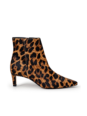 The L'AGENCE Lilly Kitten-Heel Bootie is a leopard-print city boot with a pointed toe and low kitten heel, shown on a white background.