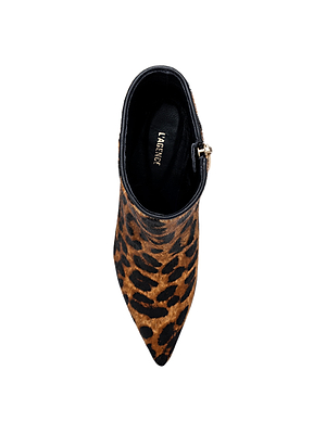 Top view of the Lilly Kitten-Heel Bootie by L'AGENCE, featuring a leopard print, pointed toe, visible side zipper, and black insole with LAURENCE in gold lettering, shown against a white background.
