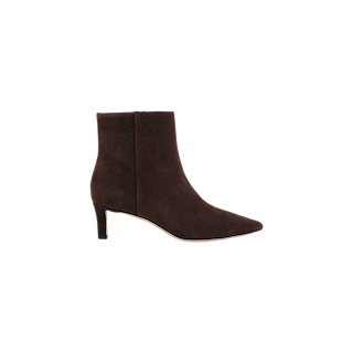 The Lilly Kitten-Heel Bootie is a dark brown suede city boot featuring a pointed toe and a mid-height kitten heel, displayed in side profile against a plain white background.