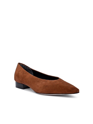 The Suzanne Ballerina Flat is a women's buckskin suede shoe featuring an elegant low heel and pointed toe, shown on a white background.