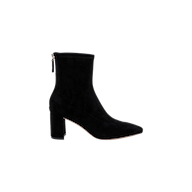 The Salome Stretch Suede Boot features a black suede finish, pointed toe, block heel, and a back zipper. It is shown from the side against a plain white background.