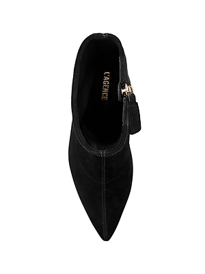 Top view of the Severine Stretch-Suede Boot in black suede, featuring a pointed toe, flared heel, side buckle detail, and L’AGENCE branding inside.