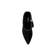 Top view of a single black Severine Stretch-Suede Boot featuring a pointed toe, gold zipper on the side, and “MACARIE” inscribed on the insole, displayed against a plain white background.
