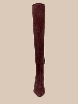 A single Clarin Over-the-Knee Boot, featuring a pointed toe in mahogany brown suede with a side zipper, is displayed from the front against a beige background.