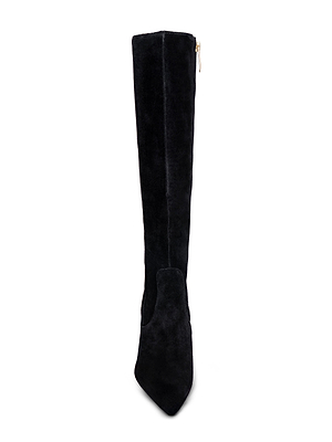 The Marya Knee-High Boot by L'AGENCE is a single black suede boot with a pointed toe, memory foam insole, and side zipper, displayed from a top-down angle.
